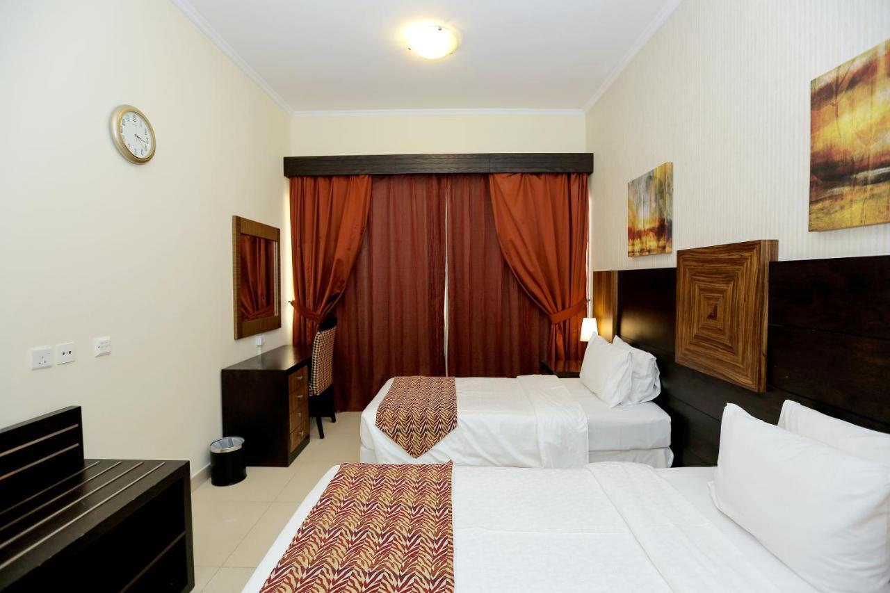 Ivory Grand Hotel Apartments Dubai Exterior foto