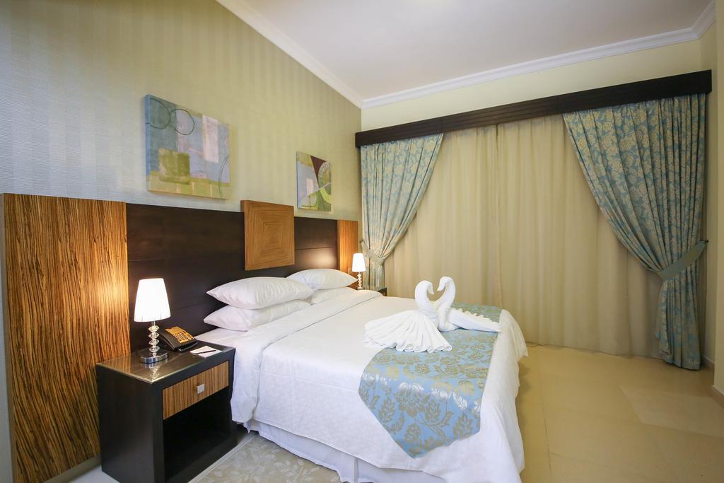 Ivory Grand Hotel Apartments Dubai Exterior foto